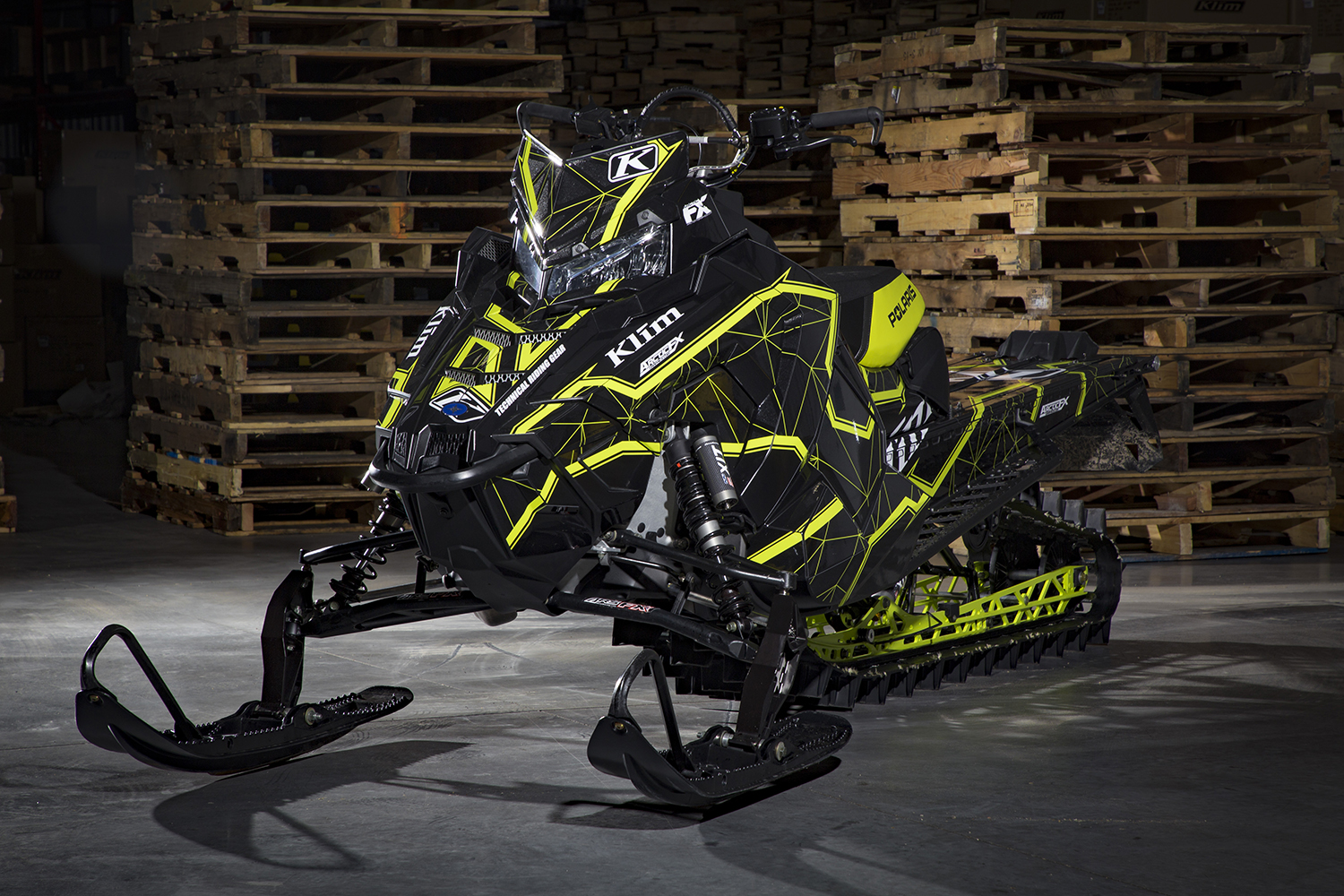 A Polaris Axys snowmobile wrapped in the all new and official Klim Demolish sledwrap